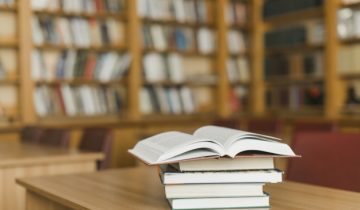 stack-books-library-desk_23-2147845946